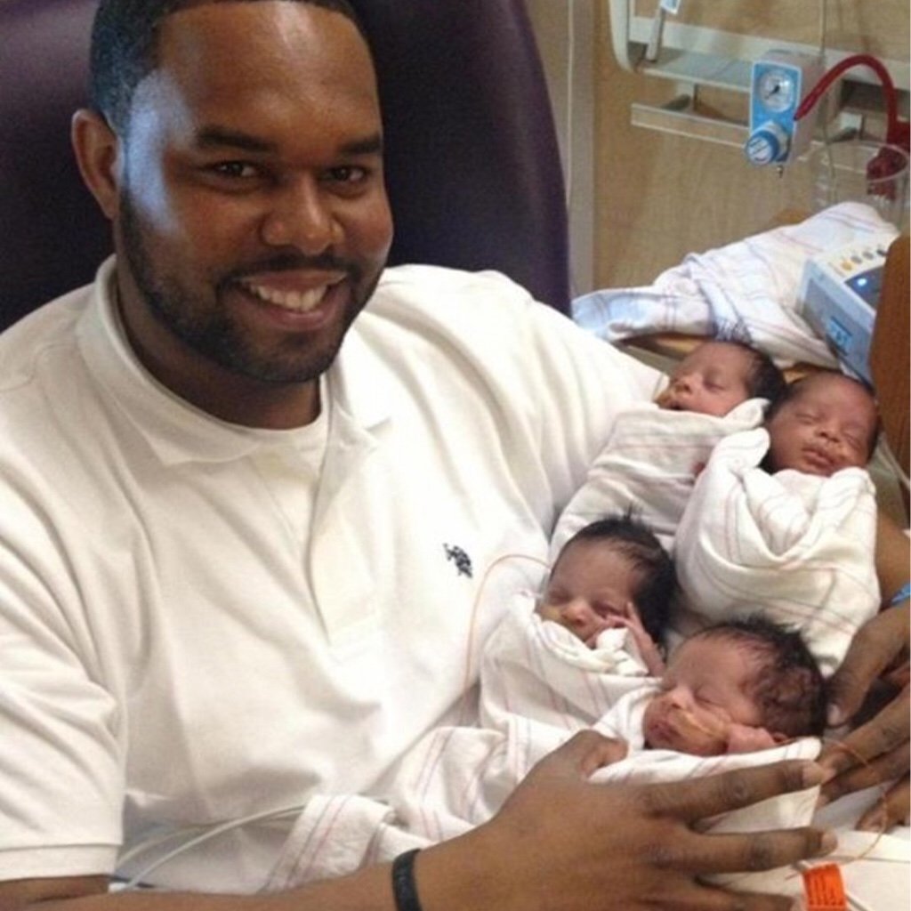 Dad Raises His Quadruplet